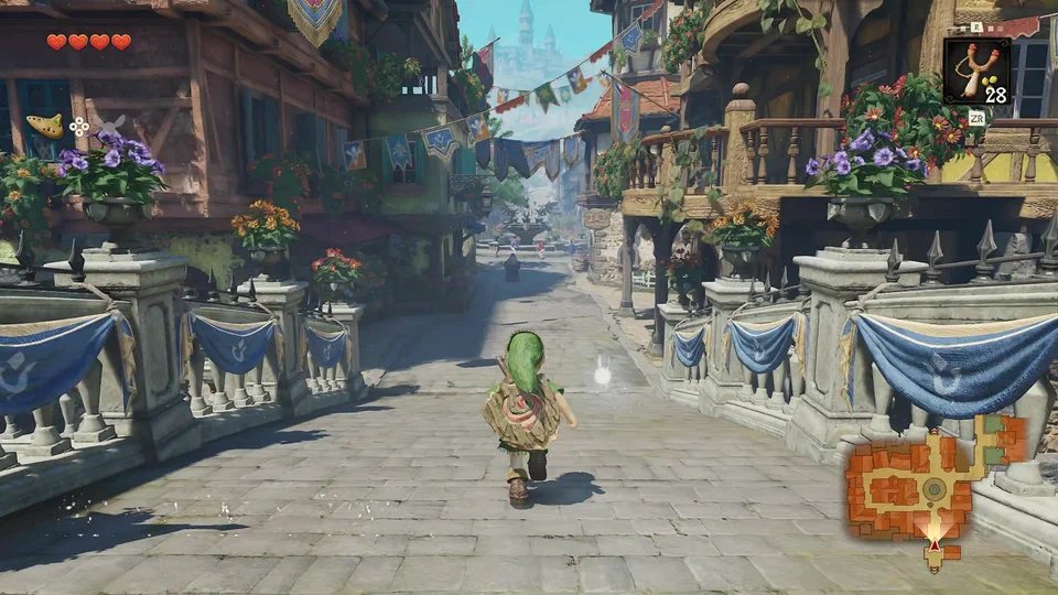 Link running down the cobbled entrance street of Hyrule Castle Town Market, half-timbered houses with flower boxes on both sides, blue Hylian Crest bunting strung overhead, a fountain plaza ahead and Hyrule Castle's spires above the rooftops