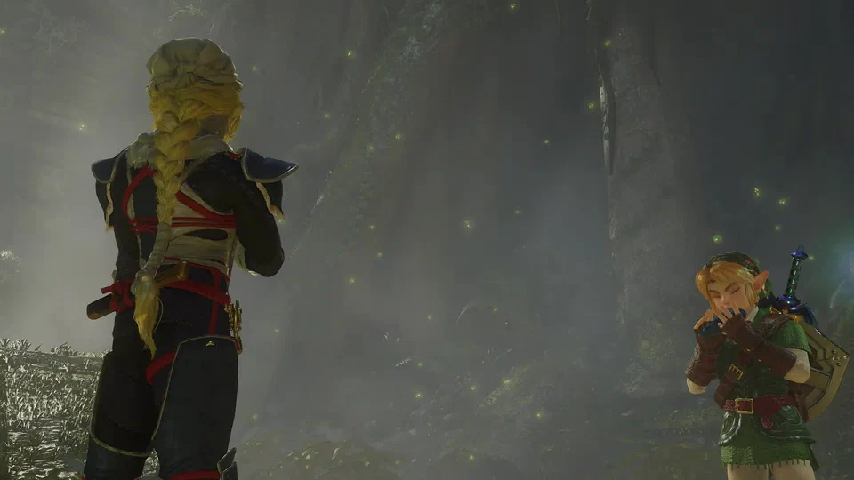 Sheik from behind, braid and shoulder pads visible, facing adult Link across a misty firefly-lit forest clearing as Link plays the Ocarina of Time, Master Sword and Hylian Shield on his back